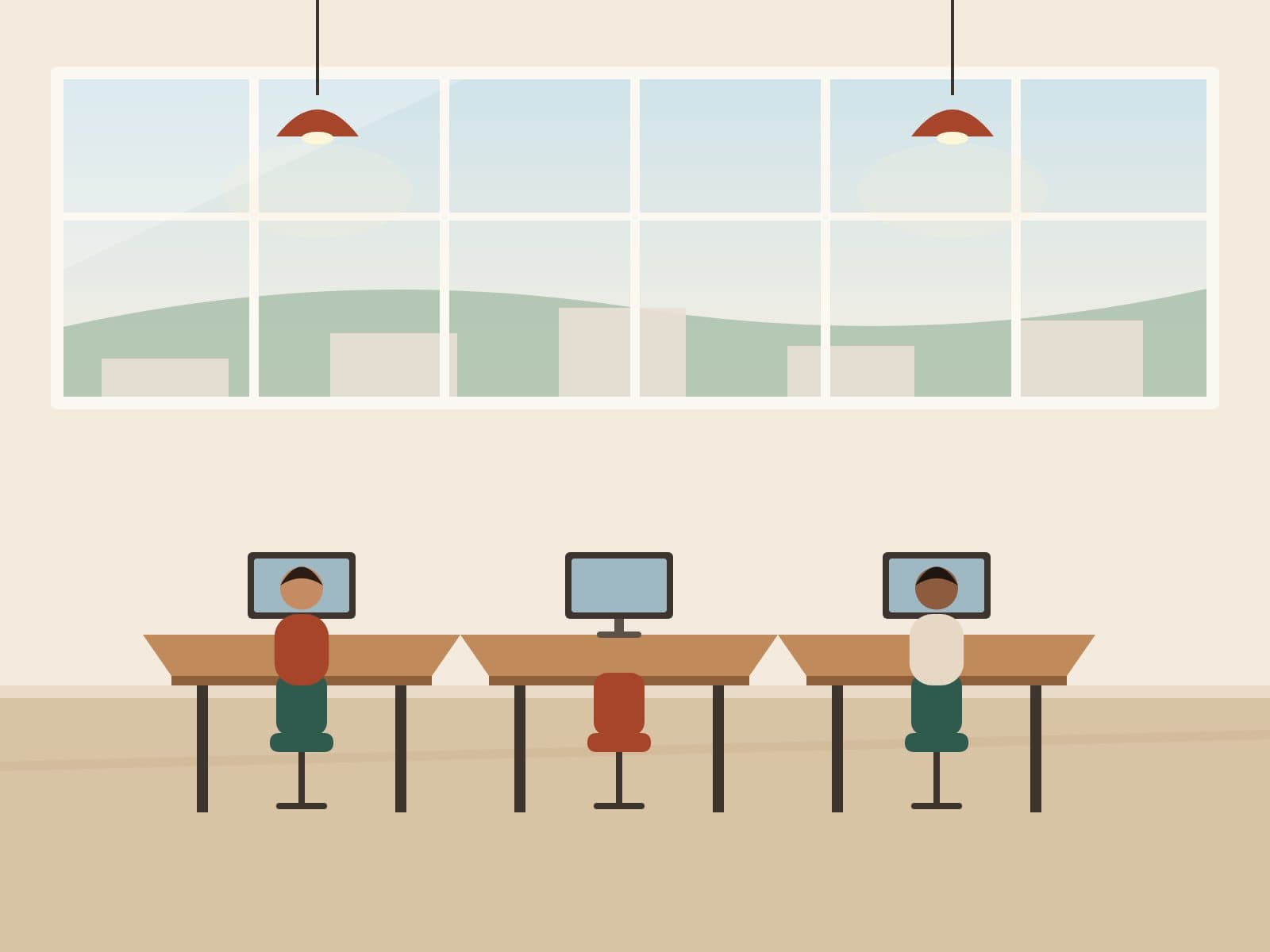 Shared workspace with rows of desks in natural light