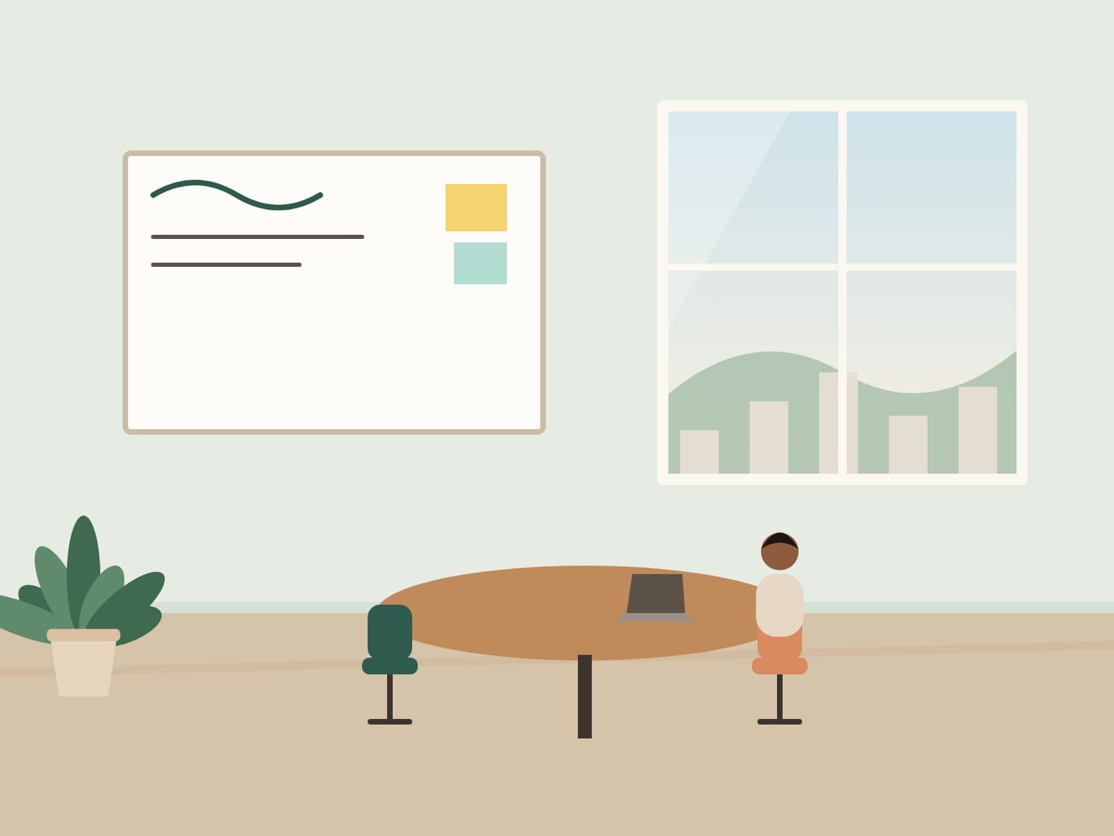 Small meeting room with a round table and whiteboard
